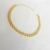 Pulseira mini corações duplos.