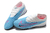 Chuteira Nike Phantom GX Elite FG Society Branca/Rosa - loja online
