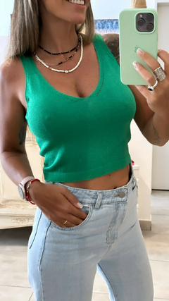 Musculosa de hilo verde con brillos