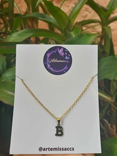 Inicial B (Acero Dorado)