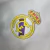 cortavento-cortaventodetime-laliga-championsligue-viniciusjr-rodrygo-edermilitao-modric-camavinga-adidas-realmadrid-santiagobernabeu-cortaventorealmadrid-cortaventorealmadridbranco-branco