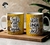 Caneca personalizada amarela com flores e frases motivacionais sobre autoestima e apoio emocional.