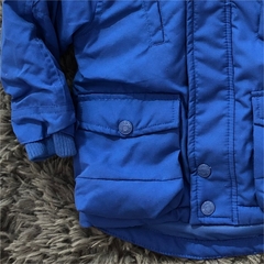 Jaqueta Puffer com pele e bolsos Azul Royal na internet