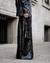 Extra wide synthetic pants with texture