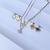 Conjunto Trevo Quatro Folhas Banhado a Ouro 18k - comprar online