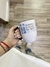 Taza de cerámica con cuchara en internet
