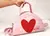 BOLSA MEIA LUA "CARREGUE AMOR" na internet