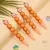 CANETA GEL LARANJA GIRA-GIRA - comprar online