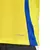 Camisa de torcedor masculina do Al Nassr para a temporada 2024/25, na cor amarela com detalhes em azul.