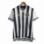 Camisa retrô do Atlético Mineiro 2020, com listras verticais pretas e brancas e escudo do time.