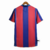 Camisa retrô do Barcelona, temporada 2007/2008, com cores vermelho e azul, logo da Nike e estampa "unicef".