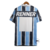 Camisa retrô do Grêmio de 1997, exibindo as tradicionais cores azul e preto, com o nome "RENNER" estampado nas costas. Um item ideal para os fãs do time e colecionadores de memorabilia esportiva.