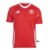 Camisa de torcedor masculina do Internacional, modelo 2025/26, predominantemente vermelha com detalhes brancos nas mangas e na gola. O design destaca o icônico escudo do clube, representando a paixão dos torcedores.