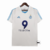 Camisa retrô do Olympique de Marseille da temporada 2002/03, na cor branca com detalhes em azul e número 9.