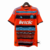Camisa retrô do Olympique de Marseille da temporada 2011/12, predominantemente laranja com listras horizontais em azul e preto, logotipo da Adidas e Betclic em destaque.