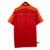 Camiseta retrô da Roma, versão 1995/96, com design vermelho e detalhes em laranja.
