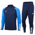 Conjunto agasalho Adidas, composto por uma camiseta de manga longa azul e calça azul, ideal para o inverno.