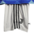 Conjunto infantil da Juventus 2022/23, com camiseta azul e short branco, estampado com detalhes geométricos coloridos.