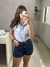 Blusa estilo camisa cropped