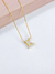 Colar Letra Cravejada em Zircônias Banhado a Ouro 18k na internet