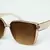 Óculos de Sol Parisiense Feminino com Lentes Degradê e UV400 na internet