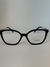 Óculos de grau Prada VPR02Z-605 preto, com design elegante, ideal para uso feminino. Armação de grau preta prada