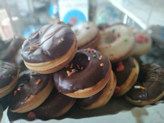 Banner de la categoría Mini donas bañadas en chocolate.