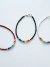 Pulsera con mostacillas y chakras