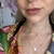 Choker Corrente Bolinhas com Espírito Santo Madrepérola - comprar online