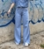 Calça wide leg clara na internet
