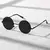 Gafas de sol redondas Retro para hombre y mujer, lentes de sol Unisex de estilo.