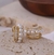 Argola dourada cravejada com mini pérolas - comprar online