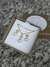 Banho em ouro 18k.
Hipoalergênica
Livre de níquel

Desperte a sua feminilidade com o encantador Conjunto Pérola Coração, uma expressão sublime de elegância e delicadeza. Este conjunto de colar e brincos é meticulosamente desenhado para adicionar um toque 