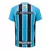 Camisa masculina do Grêmio I Tricolor Classic da Umbro, com listras azul e preta e logo da equipe.