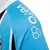 Camisa masculina do Grêmio I Tricolor Classic da Umbro, com listras azul e preta e logo da equipe.