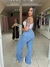 Calça wide leg jeans com puidos na internet