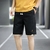 Imagem do verão calções masculinos esportes de cinco pontos calças soltas casual praia calças cor sólida tendência exterior wear tamanho grande shorts 8xl