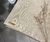 Mantel Impermeable Primera Calidad beige con dobladillo en internet