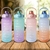 Garrafa Galão de Água Squeeze Viagem Treino Academia Com Marcador Adesivo e Canudo 2 Litros Tie Dye Gradiente - comprar online