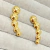 Brinco esferas dourado - comprar online