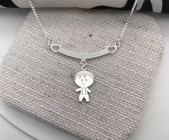 Colar canga um bonequinho