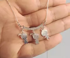Colar canga três bonequinhos