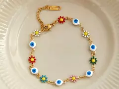 Pulserita ojito + flores