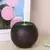 humidificador de aire redondo y de madera