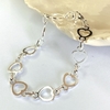 PULSERA CORAZON CALADO