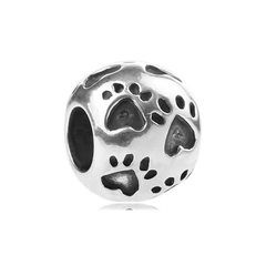 Charm bola huellas
