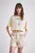 REMERA OVER PIA