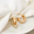 Brinco Meia Argola Lateral Cravejada Banho Ouro 18k - comprar online