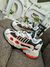 Ozweego OG White and Orange na internet