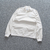 Jaqueta Nike Sport Essentials Cream